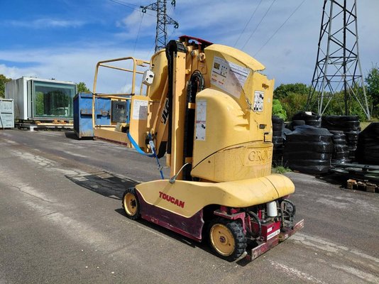 Строительный подъёмник с вертикальной мачтой JLG TOUCAN 1000 - 1